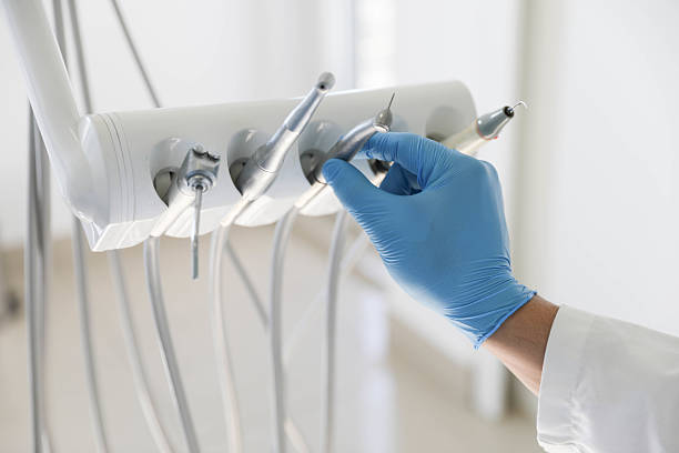 Professional Tooth Extraction technician working in Lamar County County, MS